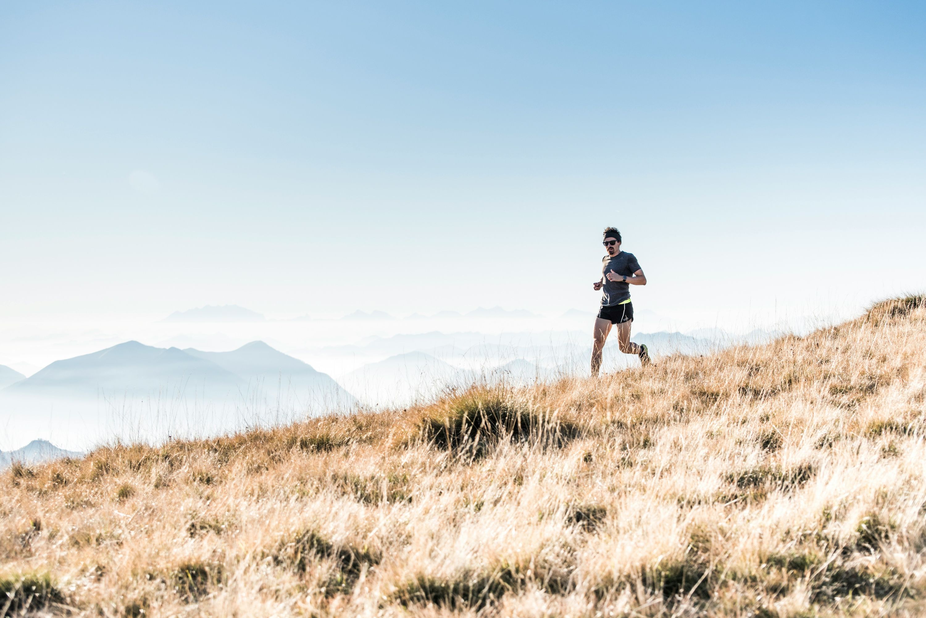 Runner navigating mountains