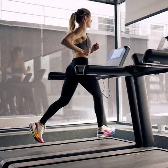 Someone running on a treadmill
