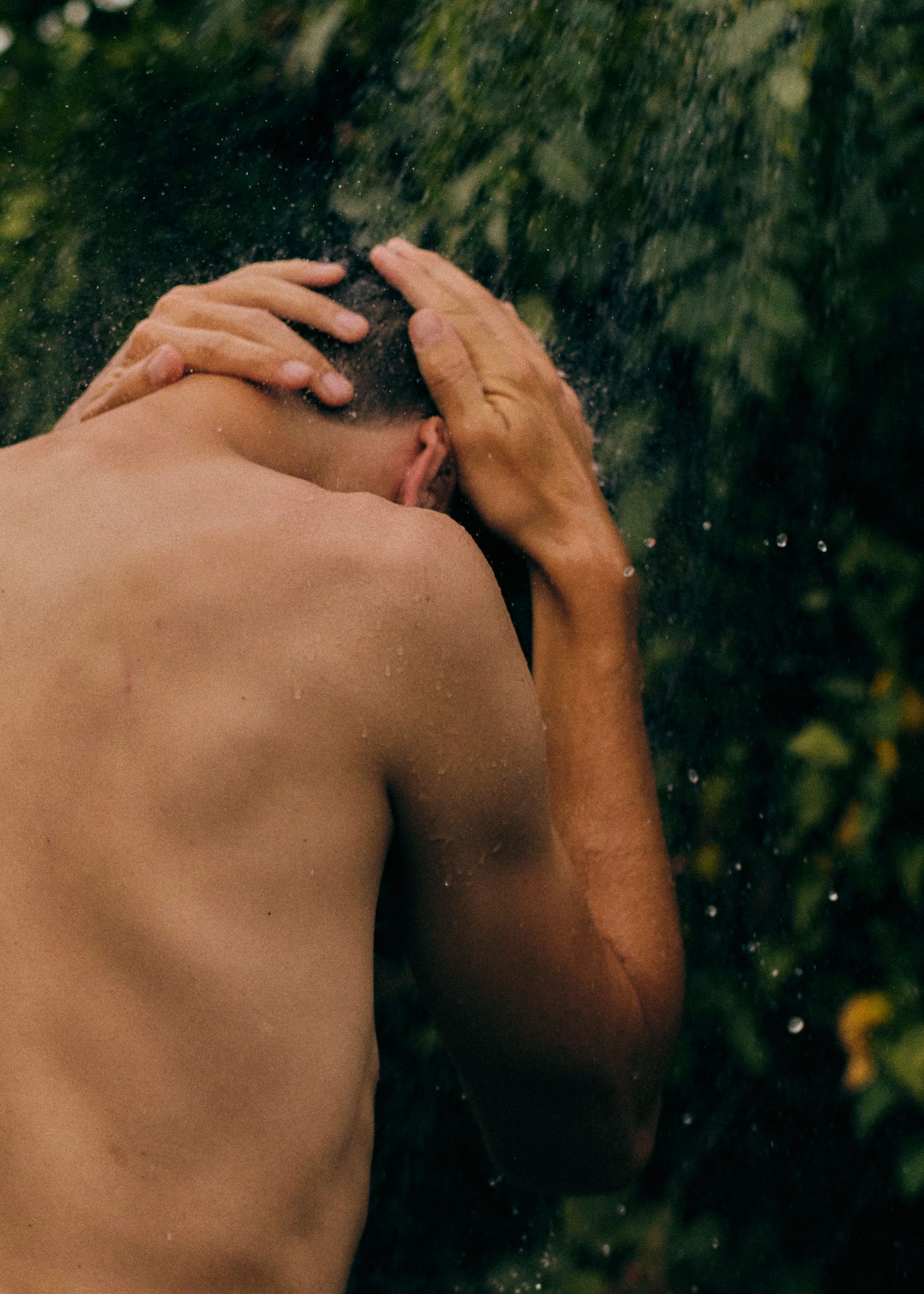 Person in outdoor shower